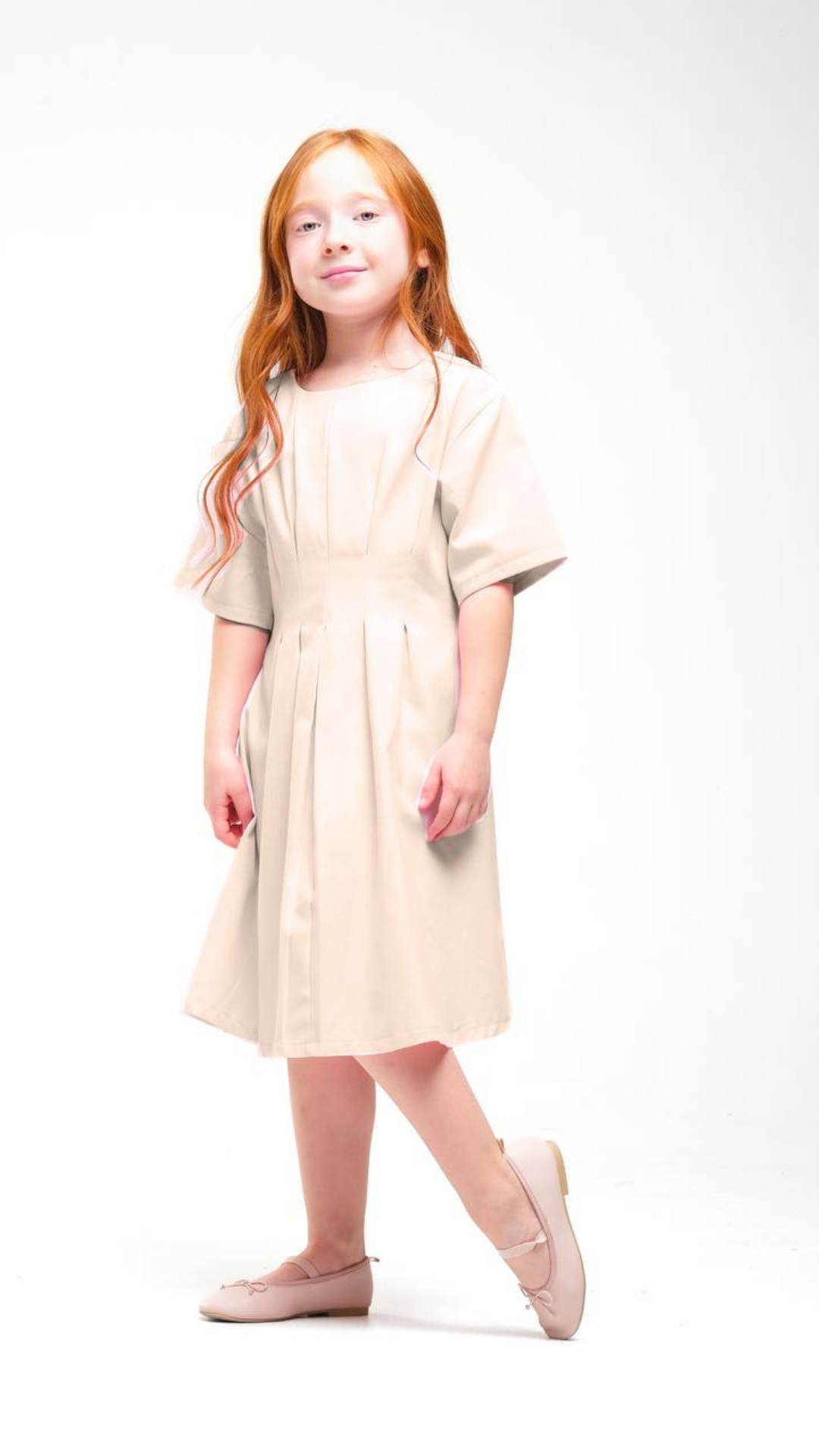 Soft Grace dress by NOV7, featuring a flowing fabric and elegant design, shown in a full-length view on a neutral background.