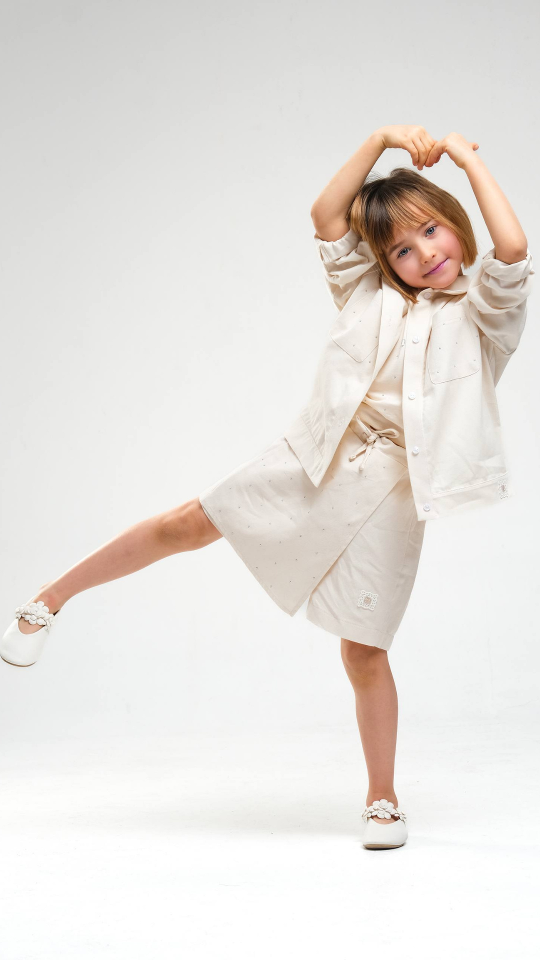 Ivory Breeze Skirt Set by NOV7 featuring a stylish matching top and skirt in soft ivory fabric.