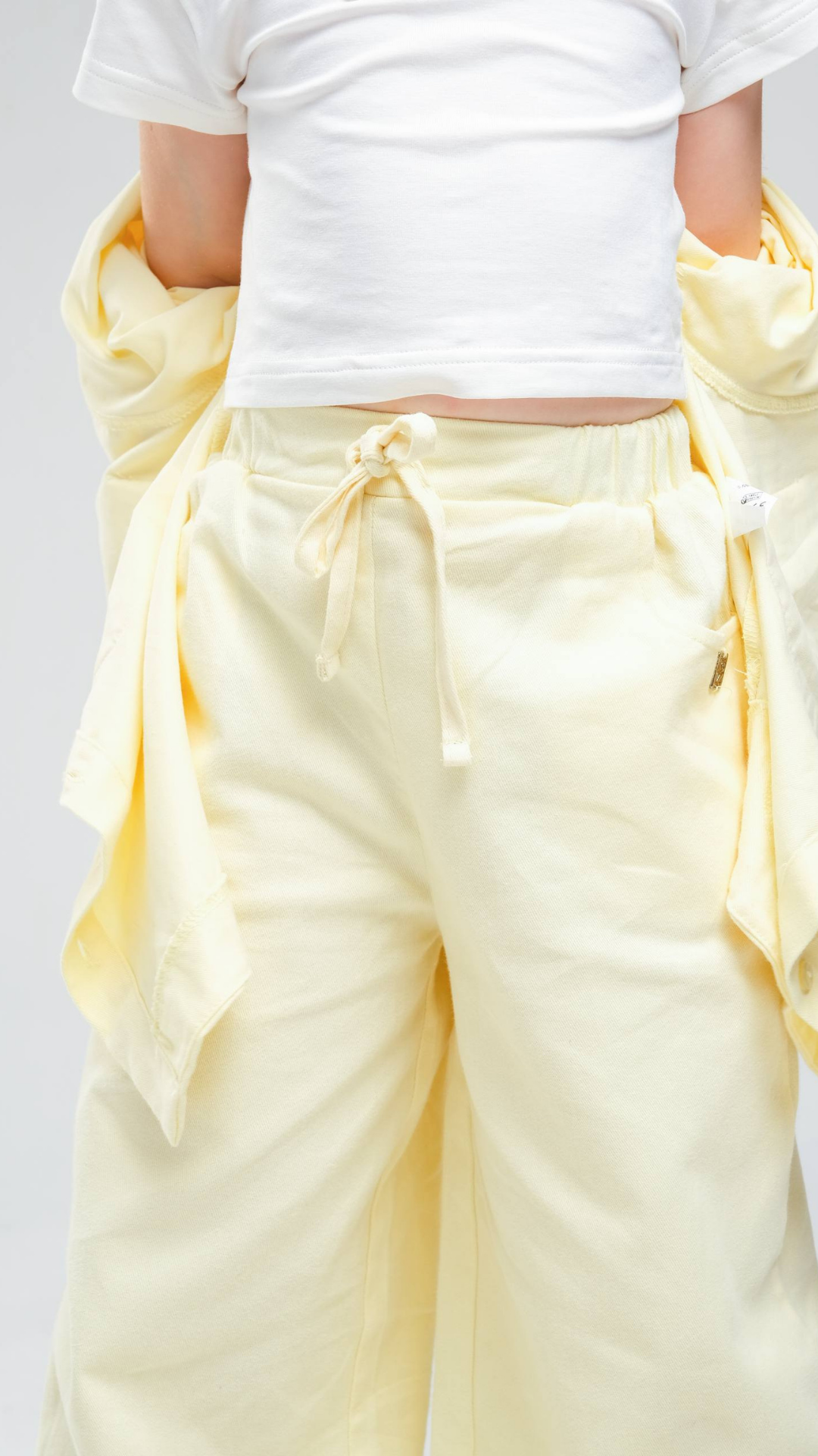 Soft Glow Two-Piece Set by NOV7 displayed on a hanger, featuring comfortable fabric and stylish design for casual wear.