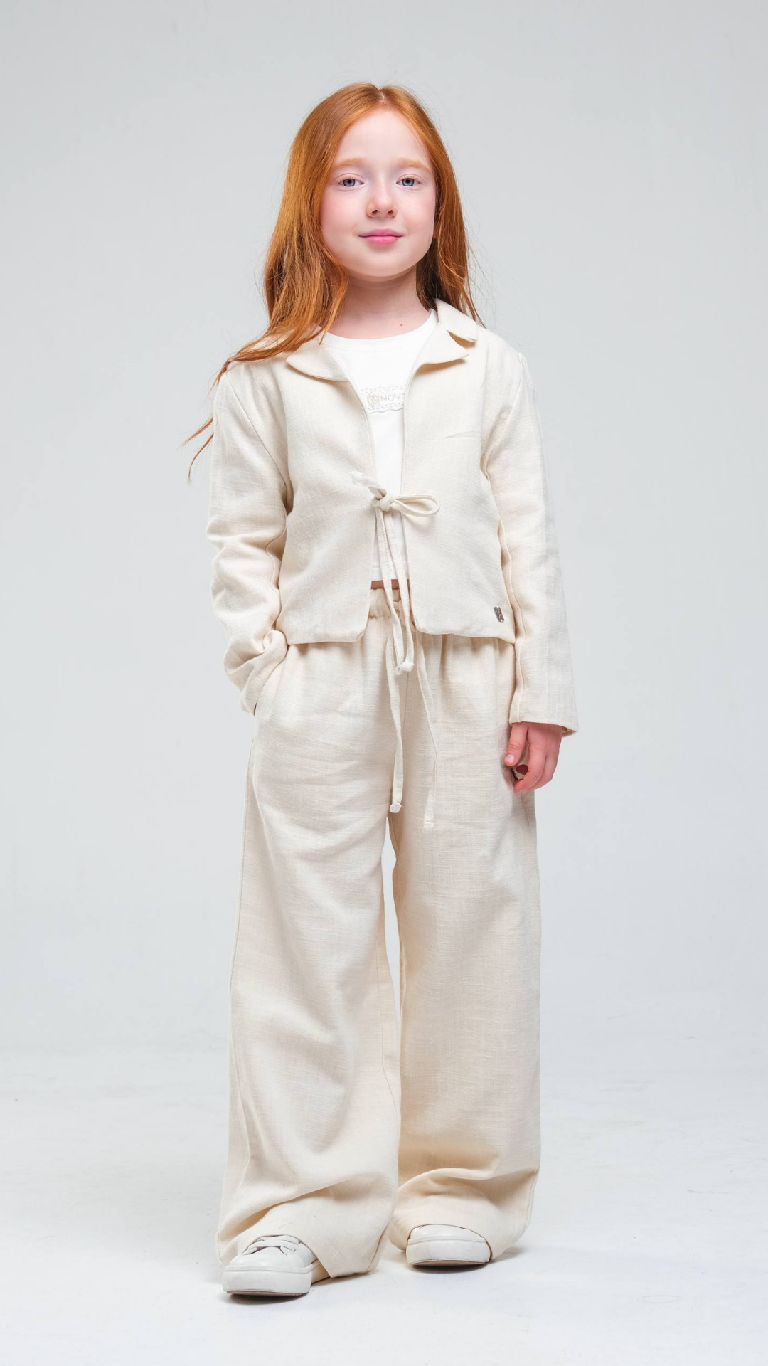 Soft Elegance Two-Piece Set by NOV7, featuring a comfortable top and matching pants in soft fabric, shown in a stylish flat lay.