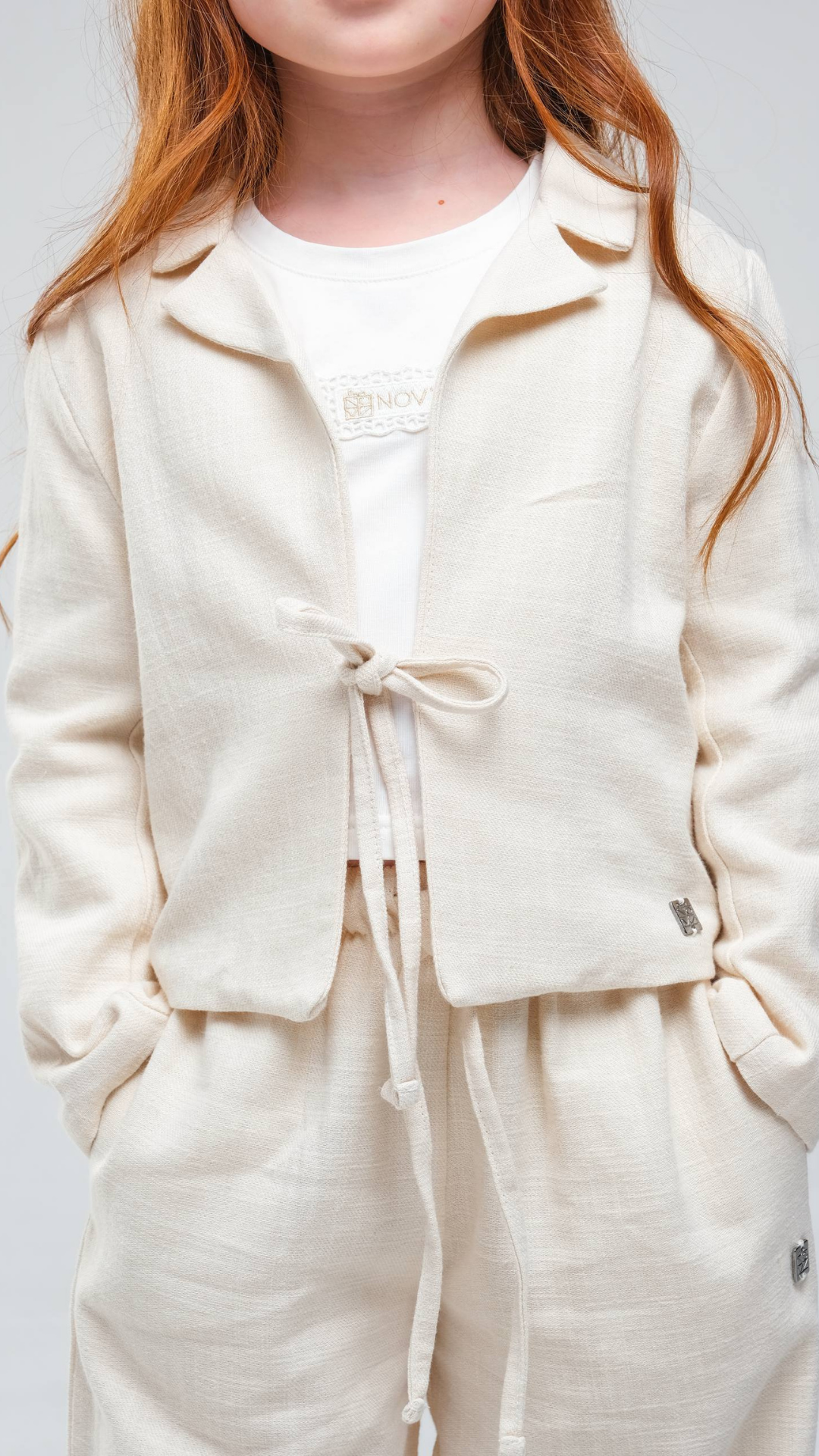 Soft Elegance Two-Piece Set by NOV7 featuring a matching top and bottom in a comfortable, stylish fabric.
