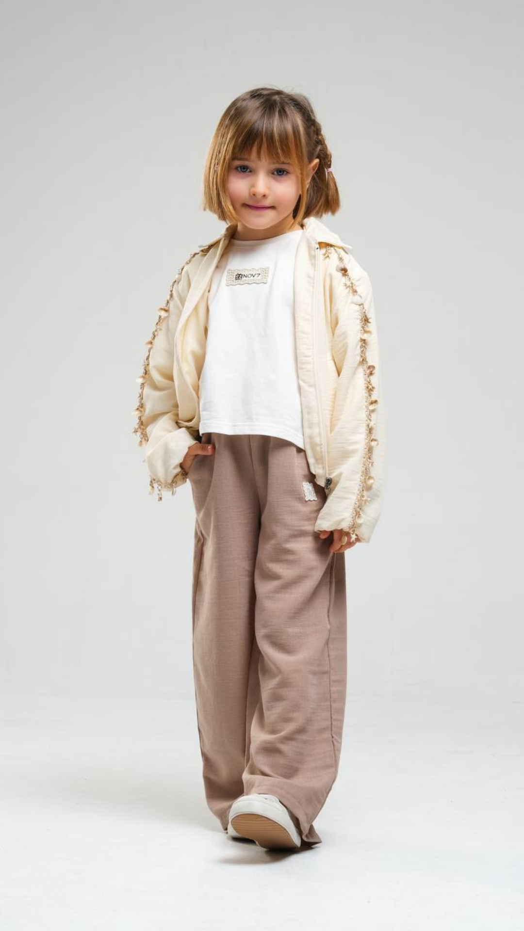 Ivory Breeze set by NOV7, featuring a stylish matching clothing set with top and bottoms in soft ivory fabric.