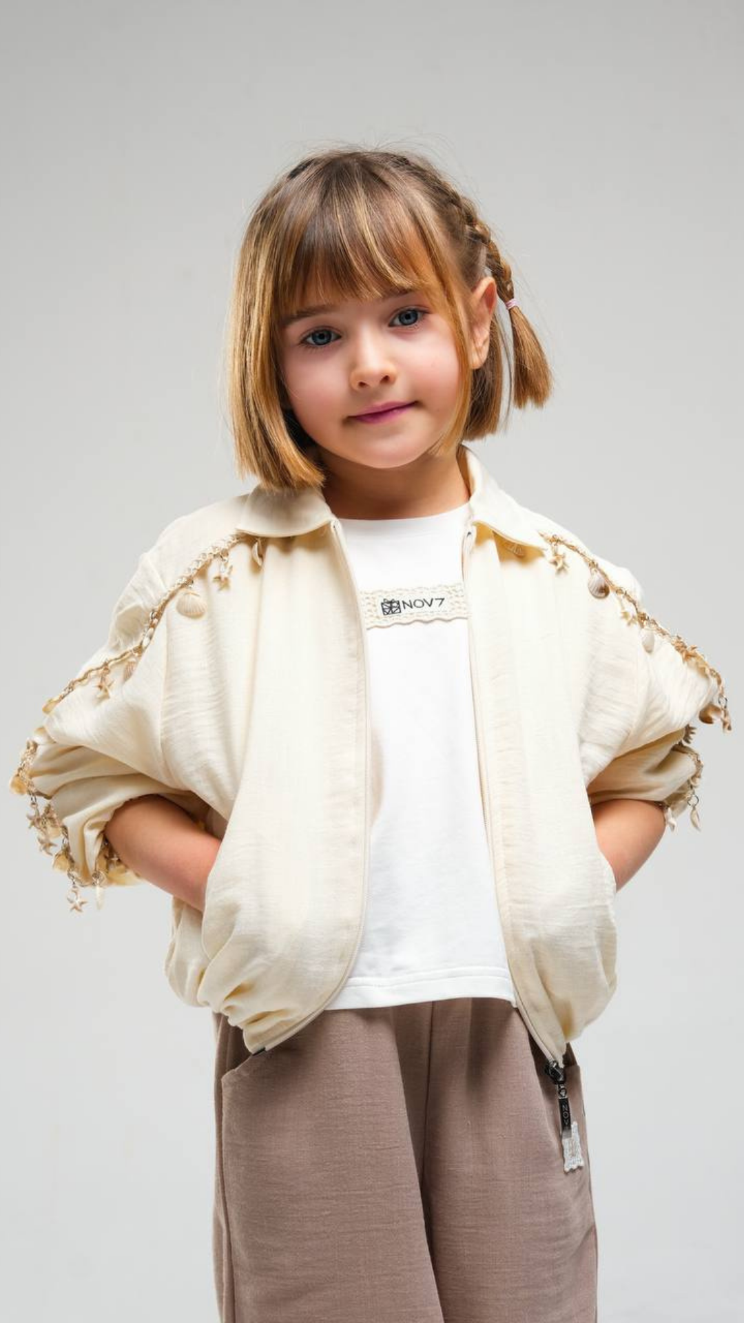 Ivory Breeze set by NOV7, featuring a coordinated collection of clothing in soft ivory fabric, displayed on a neutral background.