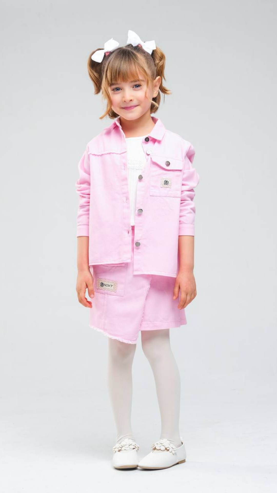 NOV7 blush charm skirt set featuring a stylish skirt and matching top, perfect for a trendy, coordinated look.