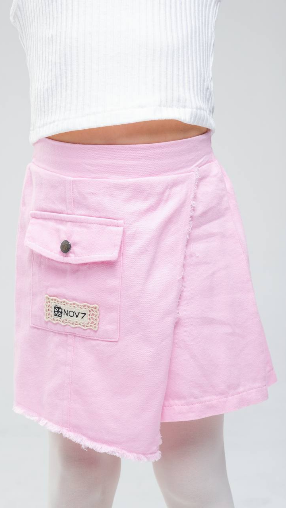 NOV7 blush charm skirt set featuring a stylish skirt and matching top, perfect for casual or semi-formal wear.