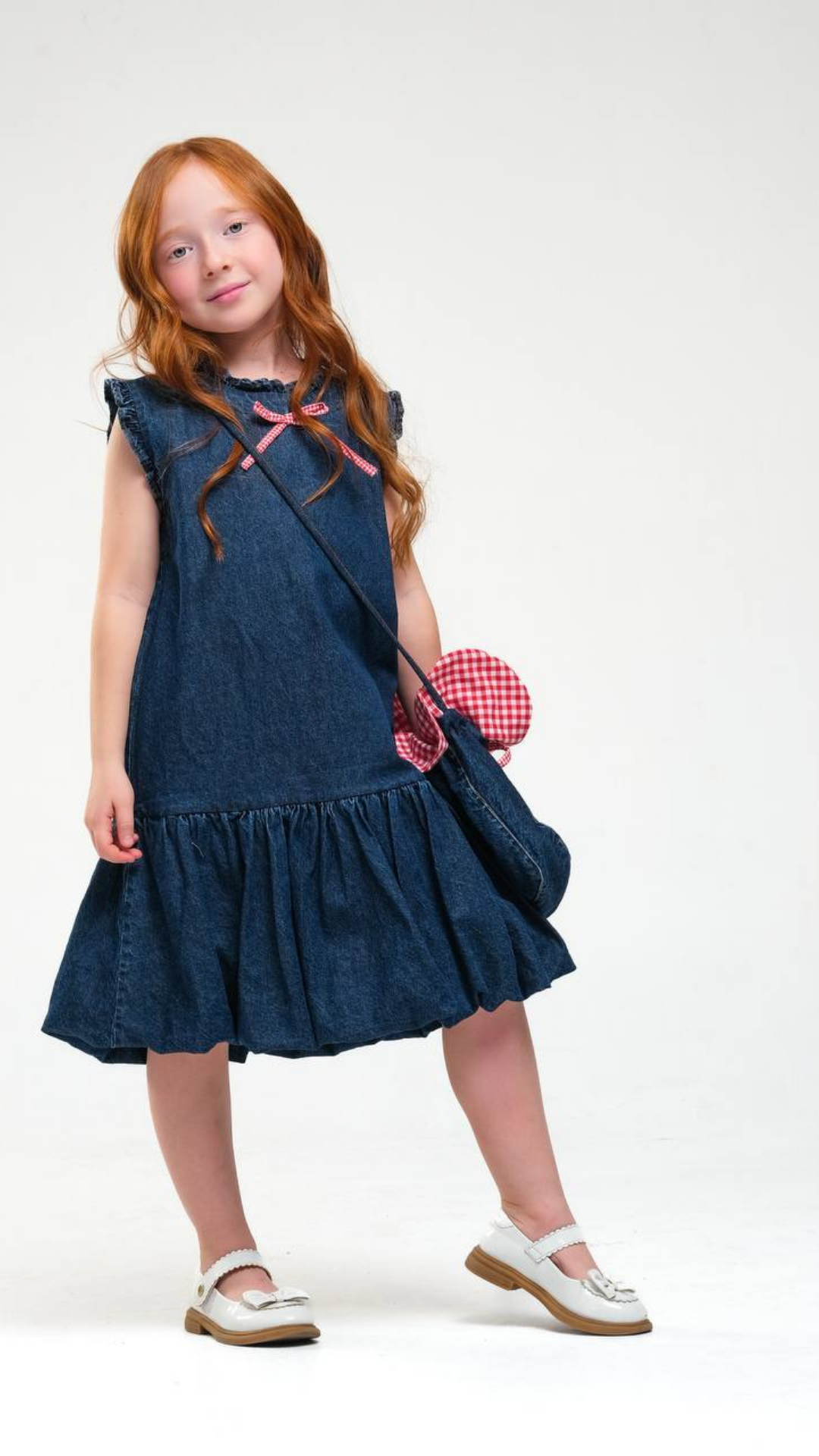Light blue denim Darling Dress by NOV7 featuring a sleeveless design and casual style, perfect for everyday wear.