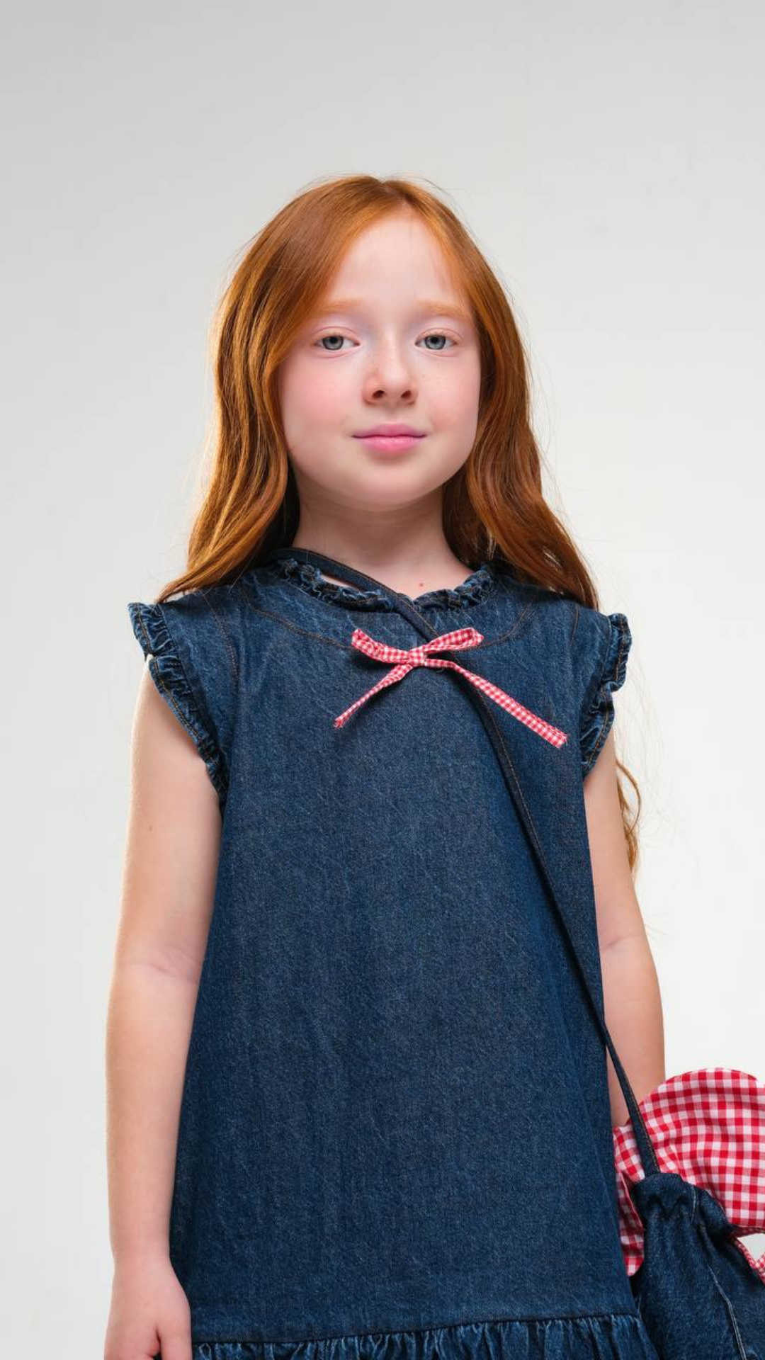 Denim Darling Dress by NOV7 featuring a stylish denim dress with a fitted bodice and flared skirt, perfect for casual wear.