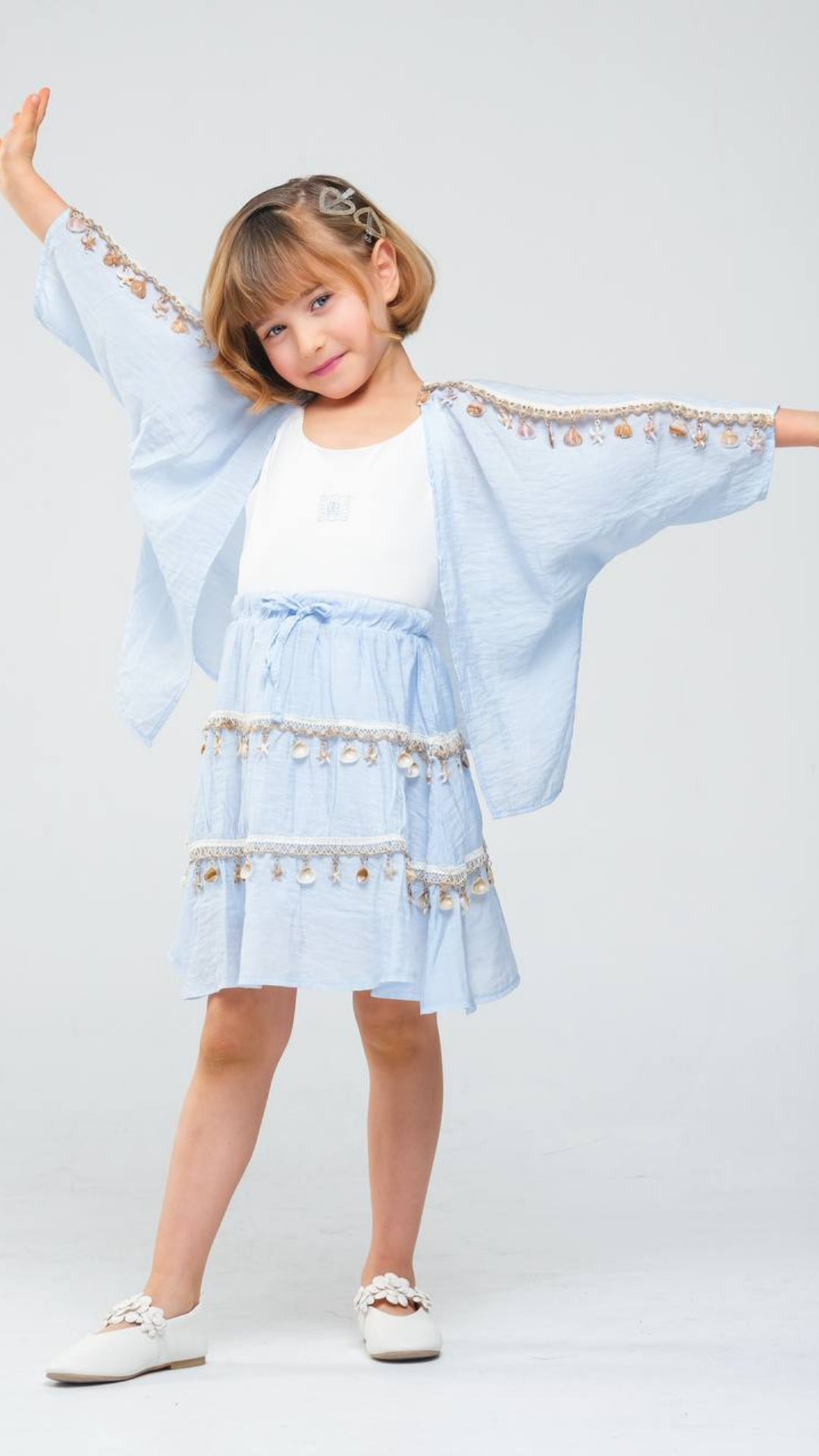 Ocean Treasure 3-piece set by NOV7 featuring colorful shells, starfish, and ocean-themed accessories on a white background.