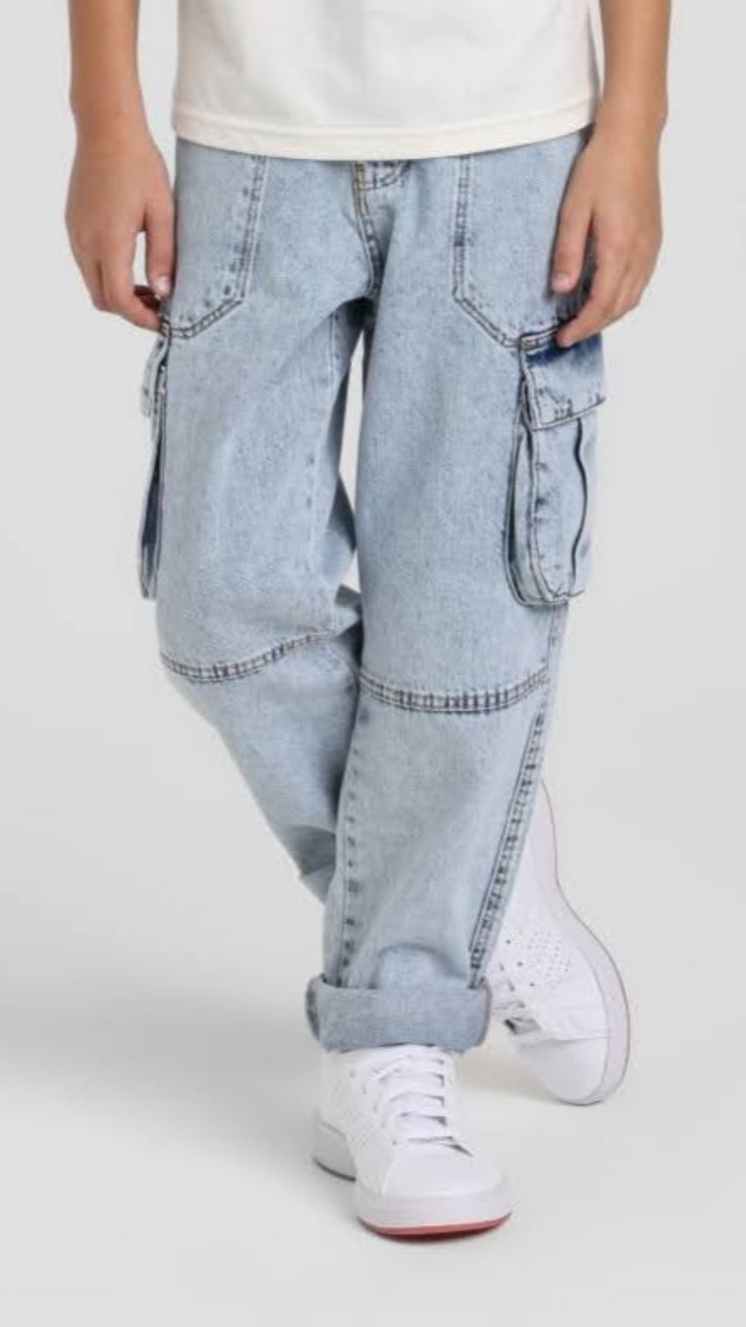 Escable Kids Explorer Cargo Denim Pants, durable jeans with cargo pockets, shown in a casual children's fashion style.