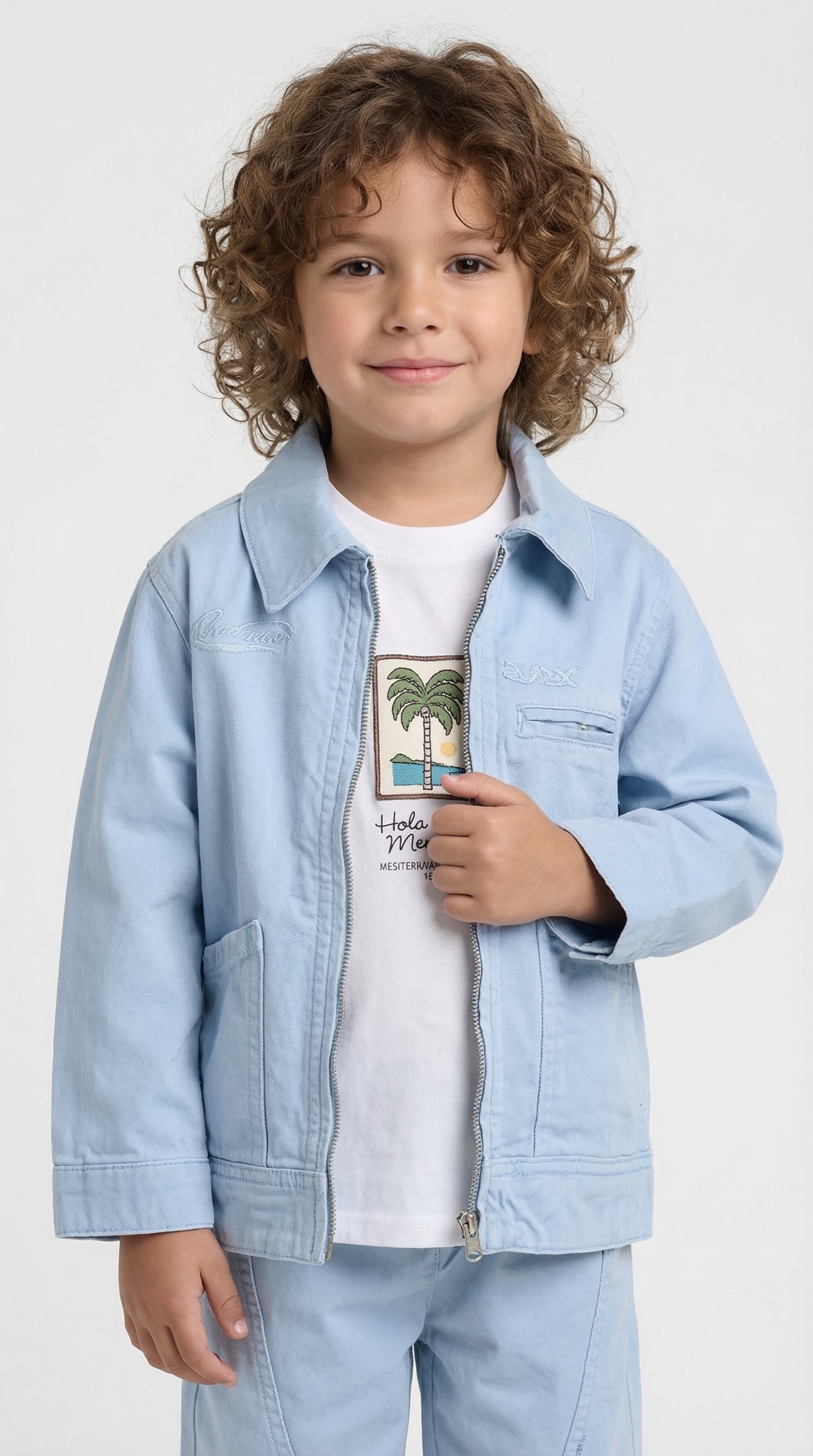 Sky Explorer Three-Piece Set by Escable Kids featuring a colorful shirt, shorts, and cap for adventurous children.