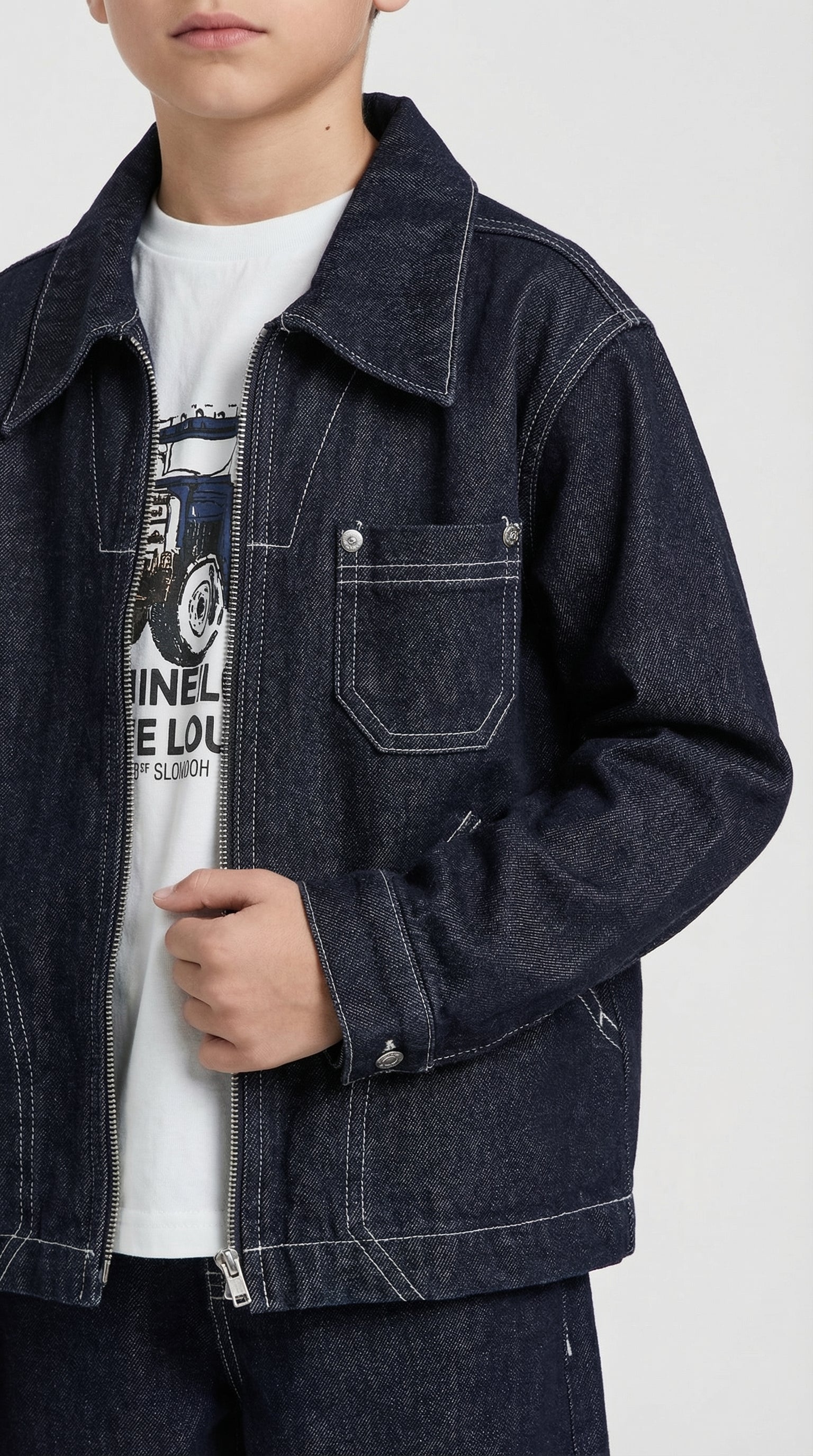 Children's denim jacket and pants set by Escable Kids, featuring classic blue denim fabric and casual style.