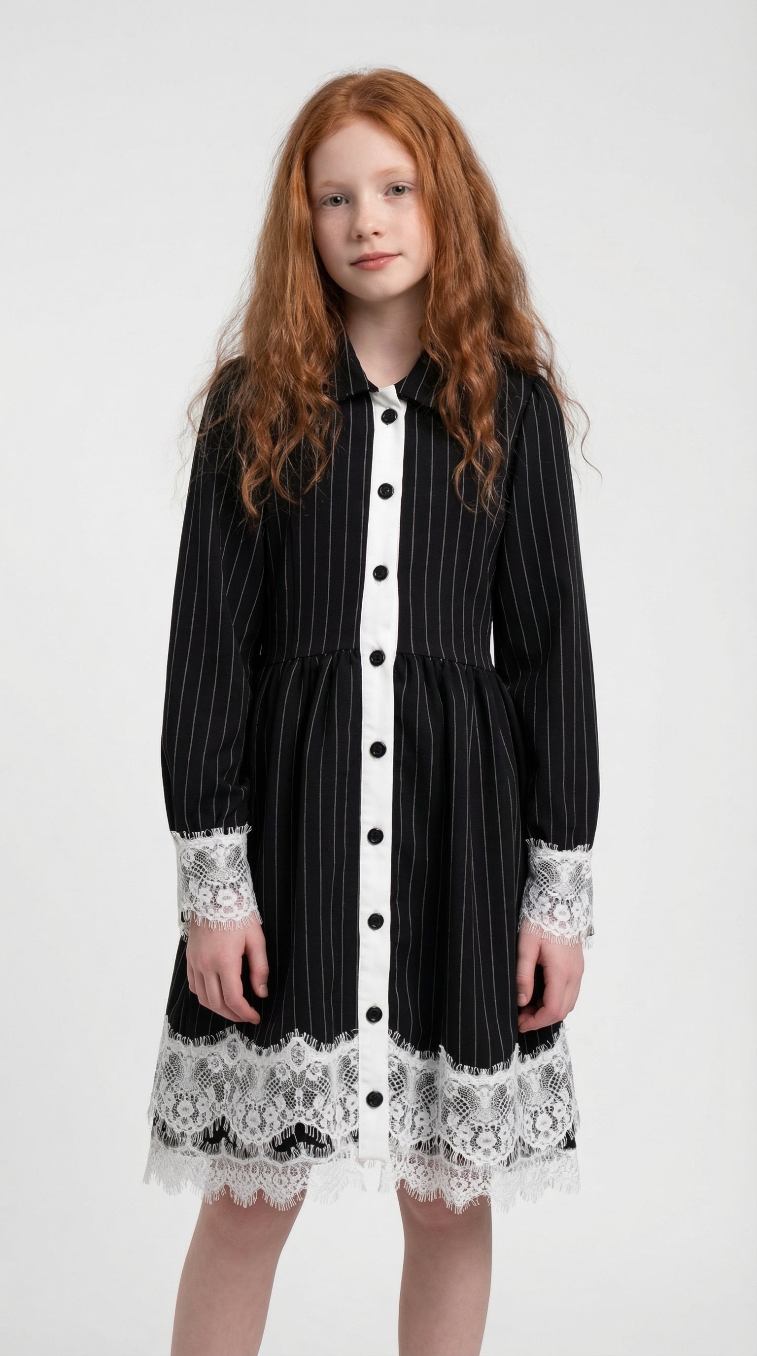 Children's lace dress with midnight pinstripes from Escable Kids, featuring a stylish and elegant design for special occasions.