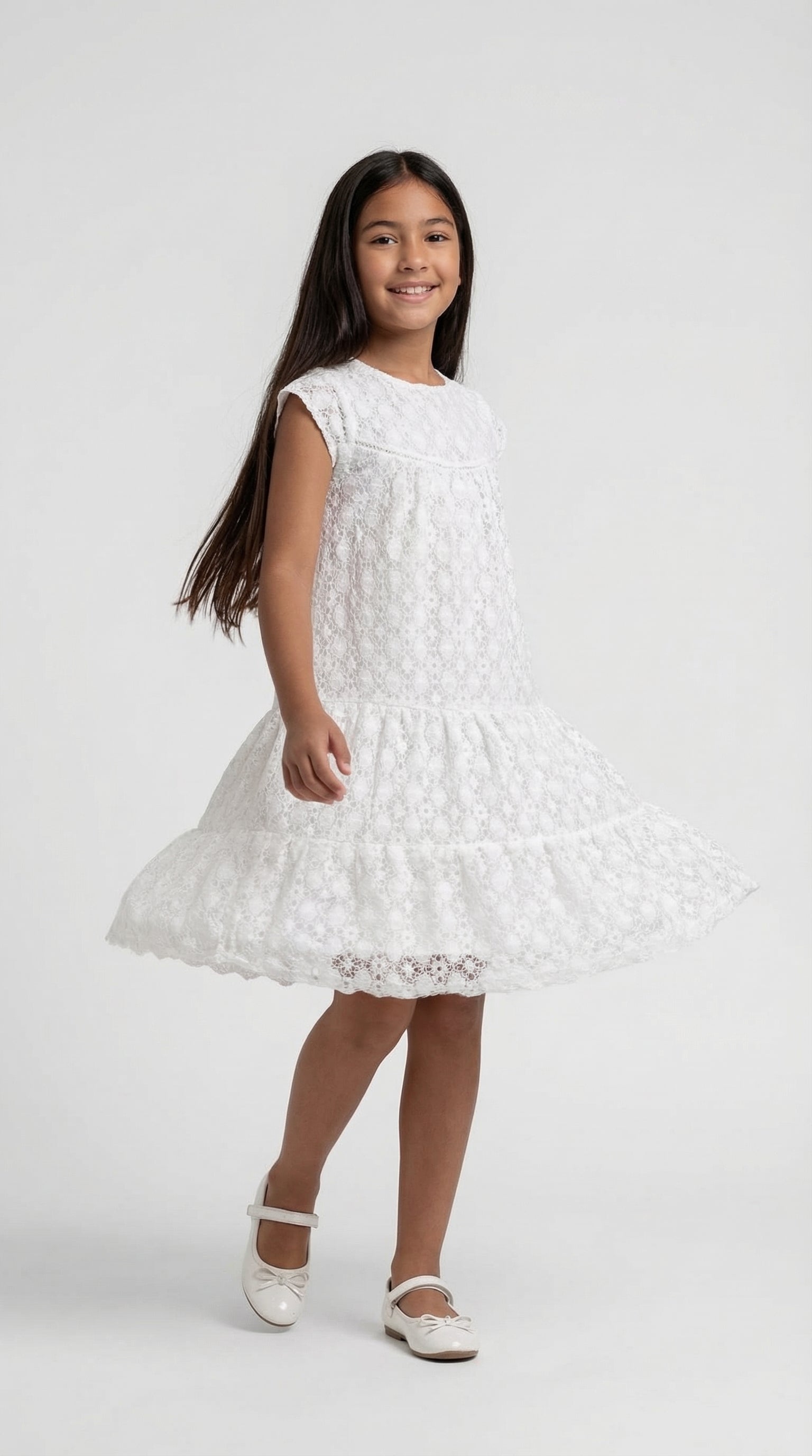 Children's pearl lace tier dress by Escable Kids, featuring delicate lace layers and a charming, elegant design for special occasions.