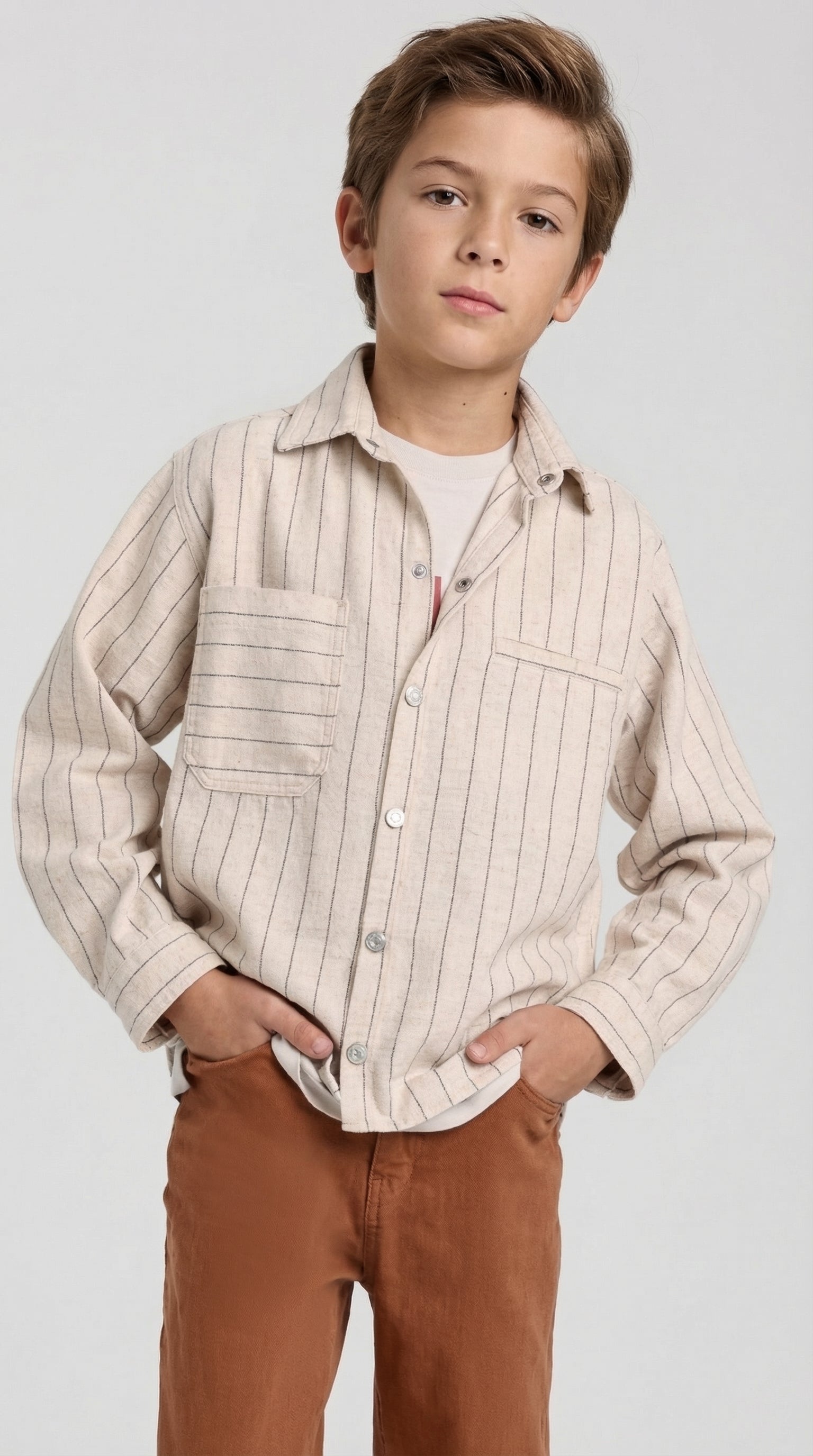 Children's beige pinstripe utility shirt by Escable Kids, featuring a collared design with button-front and long sleeves.