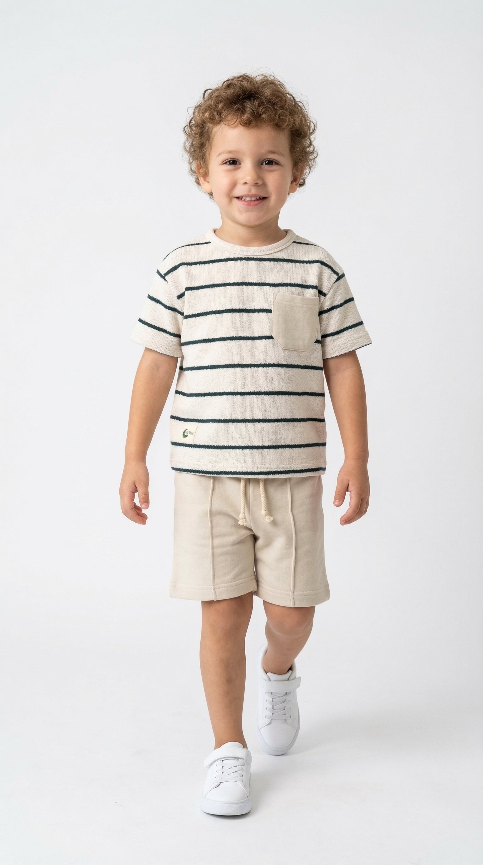 Children's summer set with sand stripe pattern from Bobby Jr Kids Wear, featuring a comfortable top and shorts for warm weather.