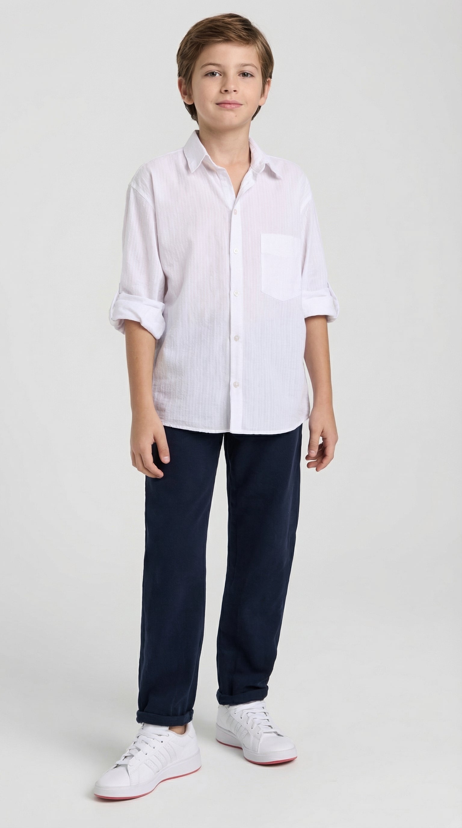 Children's classic white shirt and navy pants set by Escable Kids, featuring a neat button-up shirt and tailored navy trousers.
