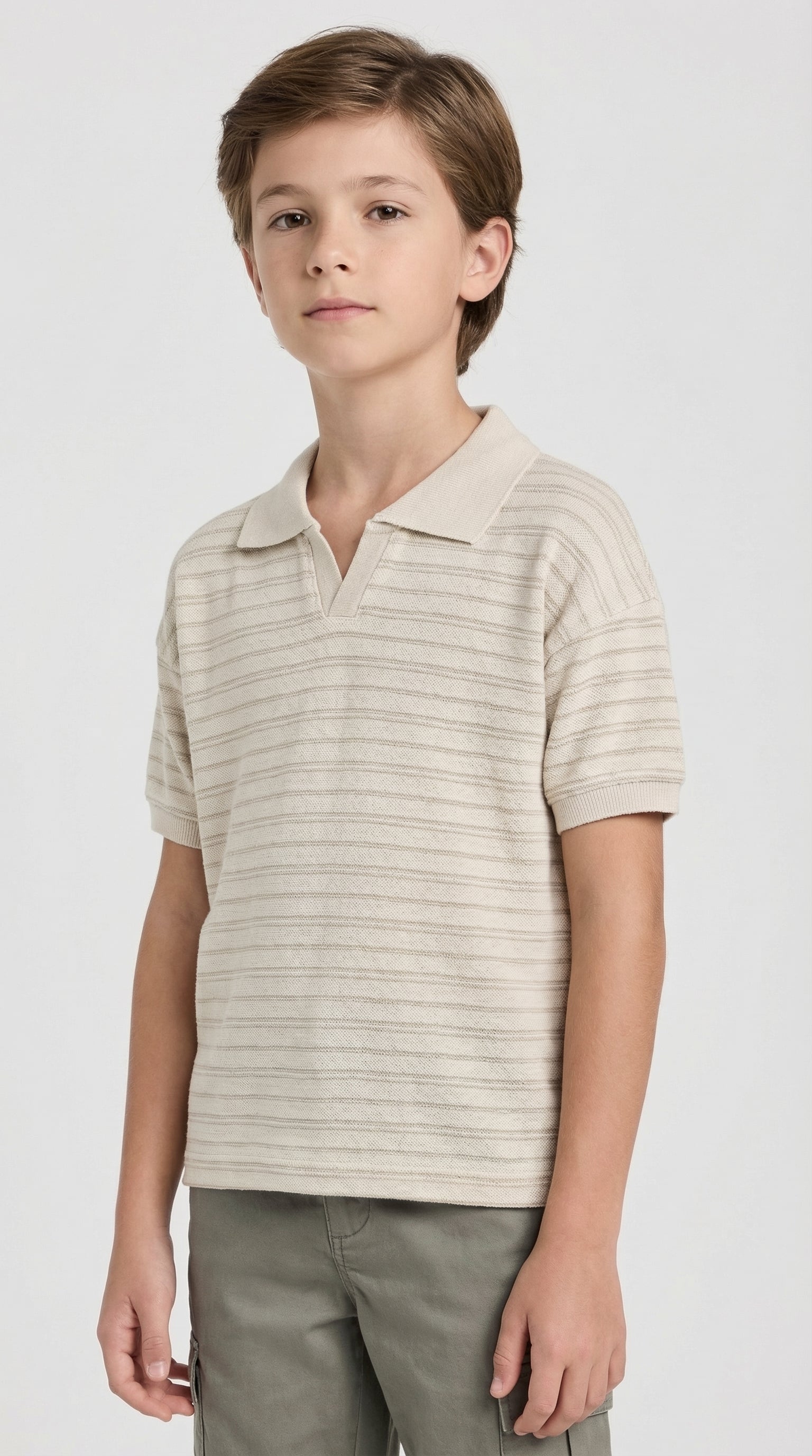 Children's classic knit polo T-shirt by Escable Kids, featuring a blue polo shirt with a collar and short sleeves.