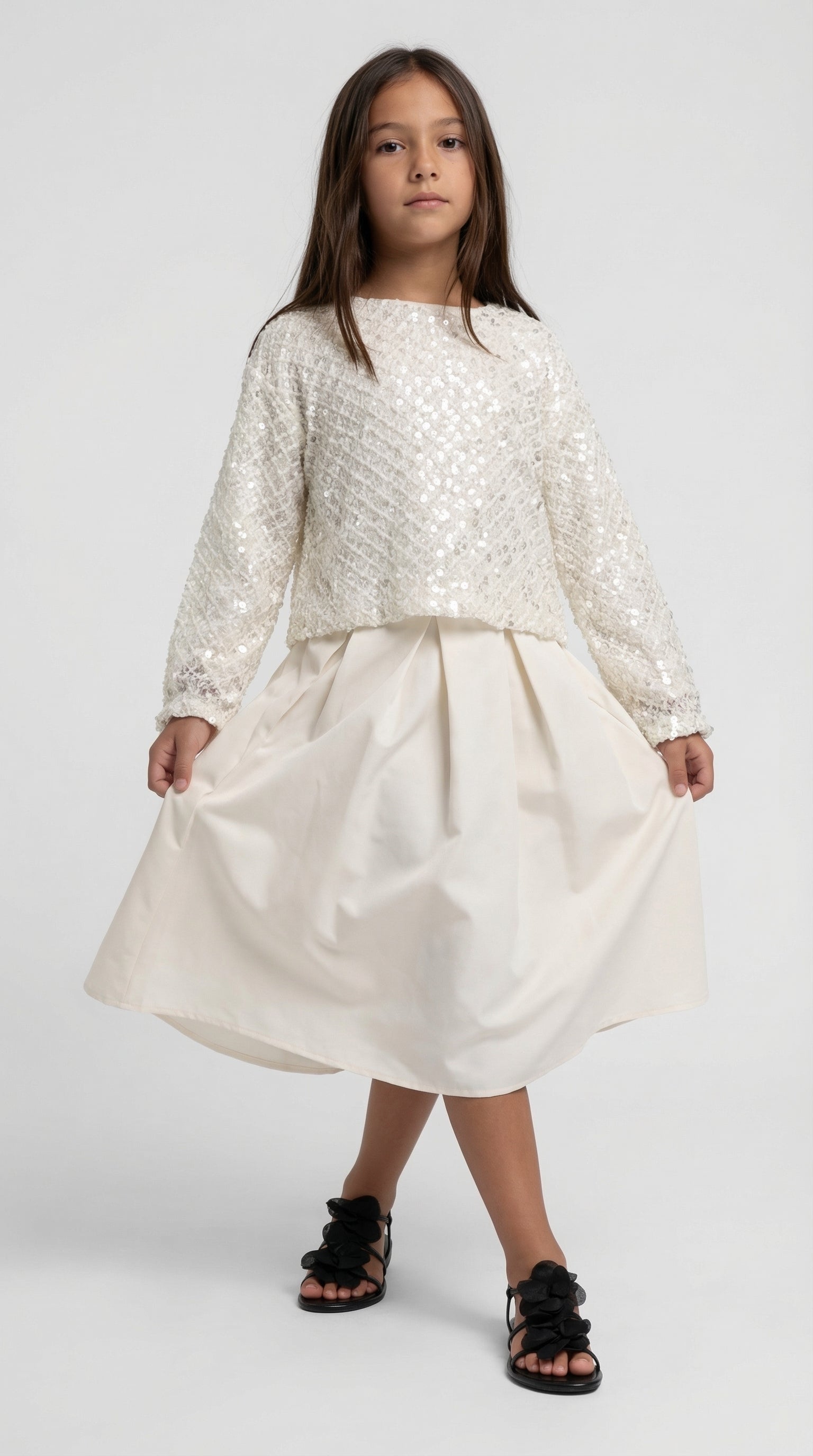 Ivory sparkle dress set for children by Escable Kids, featuring a shimmering fabric and elegant design for special occasions.