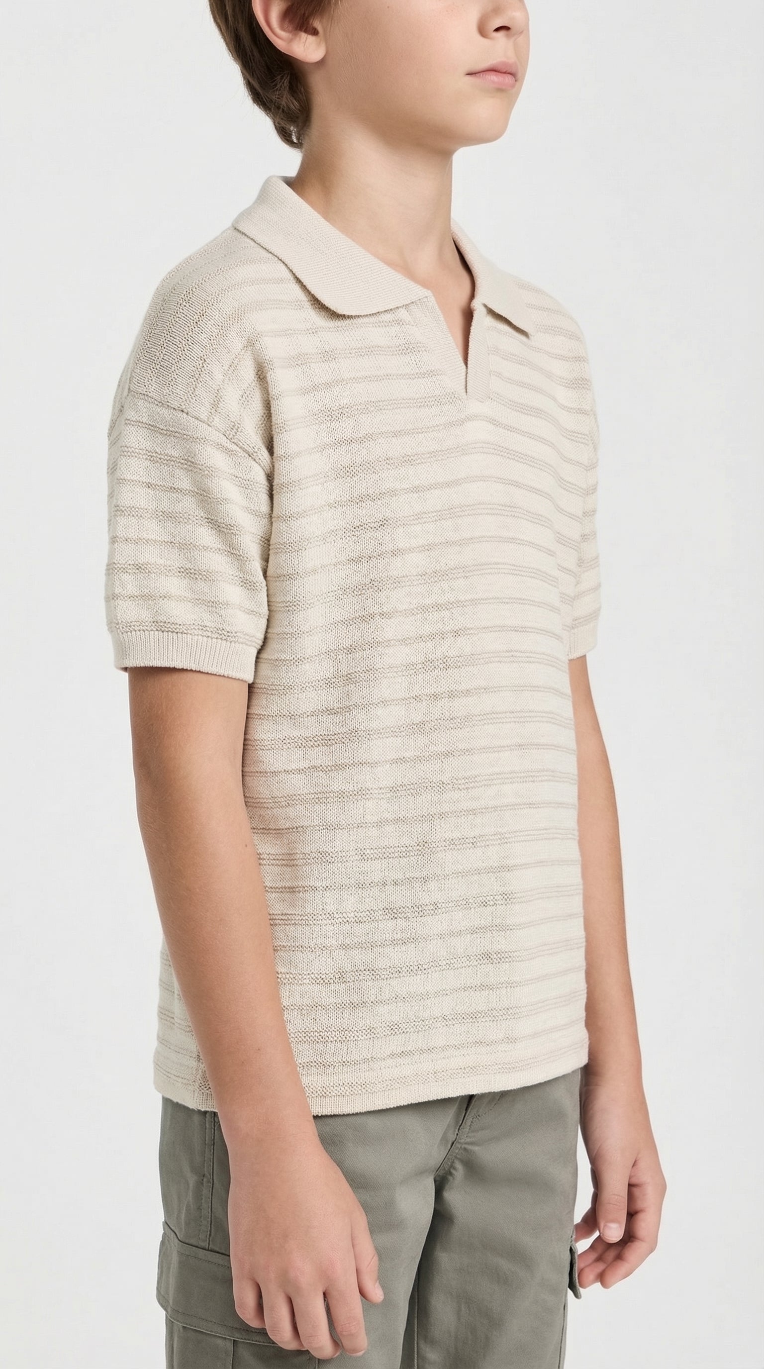 Children's classic knit polo t-shirt by Escable Kids, featuring a soft, textured fabric and a traditional polo collar.