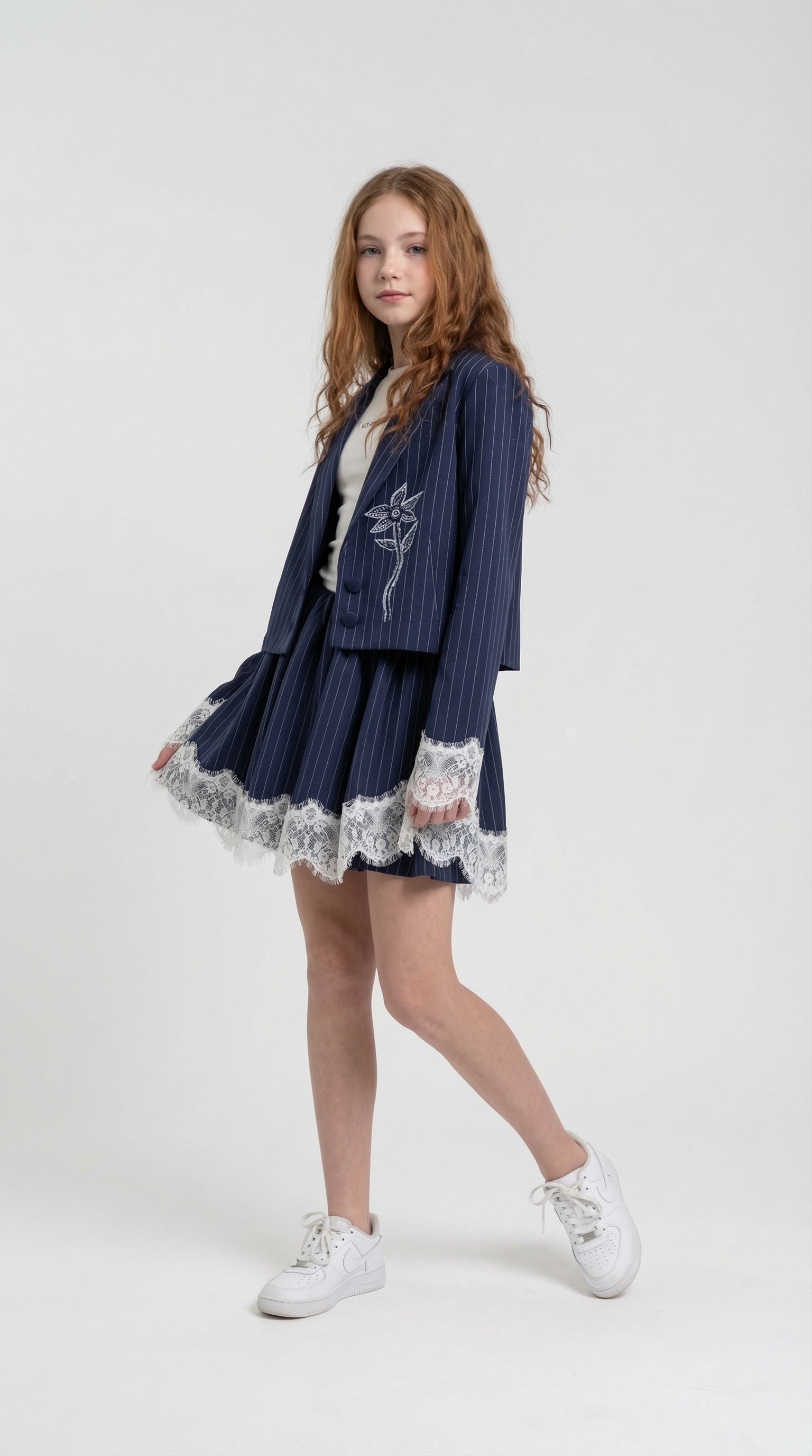 Children's navy pinstripe lace trim set by Escable Kids, featuring a coordinated top and bottom with delicate lace details.
