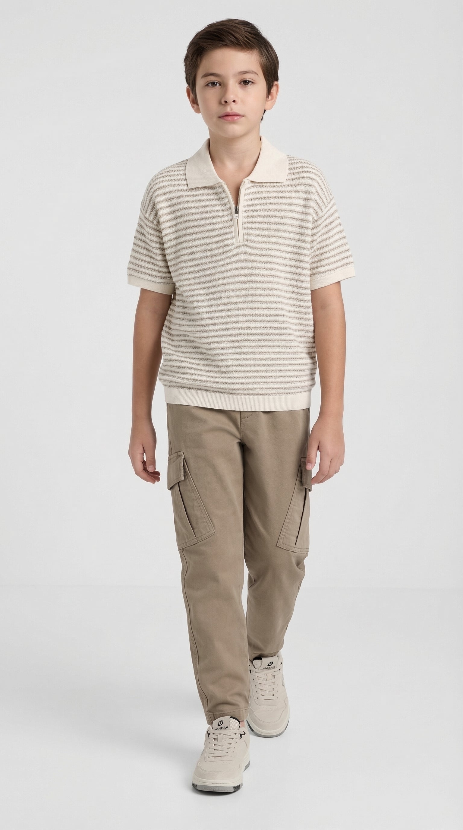 Children's beige knit polo and sand cargo set by Escable Kids, featuring a cozy knit top and casual cargo pants.
